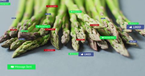 Fresh asparagus featuring social media notification icons