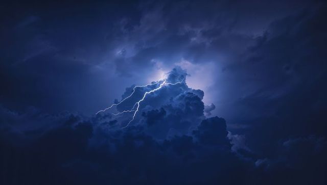 Striking Lightning Bolt in Stormy Night Sky Visual Drama