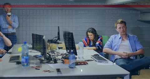 Diverse Team Engaged in Financial Data Processing