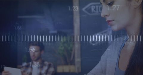 Tech Icons Overlay and Woman Using Laptop in Modern Office