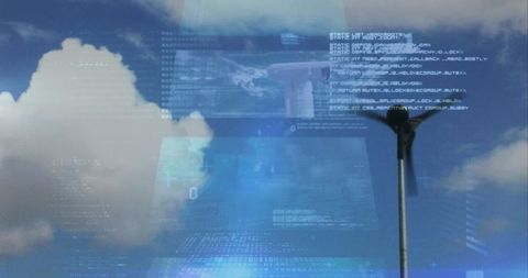 Digital Financial Data Reflecting on Wind Turbine Against Blue Sky