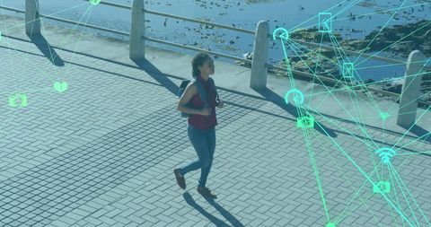 Woman Walking on Tech-Empowered Urban Sidewalk - Download Free Stock Images Pikwizard.com