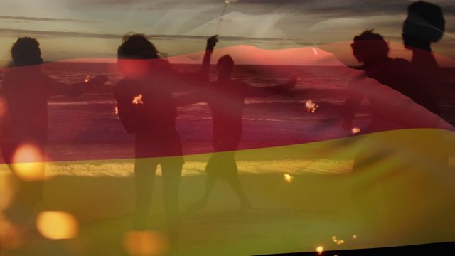 Friends celebrating on the beach at sunset holding sparklers, overlaid with the German flag. Suitable for themes of friendship, celebration, patriotism and multicultural gatherings. Perfect for events promotions, social media posts celebrating German holidays or creating content on inclusivity and enjoyment.