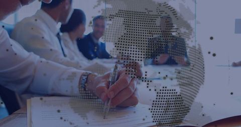 Business team meeting with global concept overlay