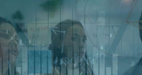 Professionals Analyzing Financial Trends on Glass Board