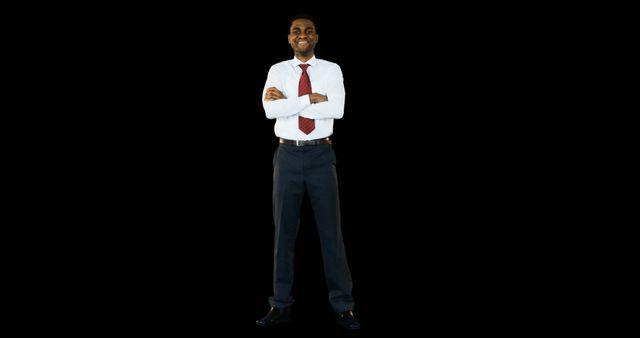 Confident Professional Man Standing with Arms Crossed Against Black Background - Download Free Stock Images Pikwizard.com