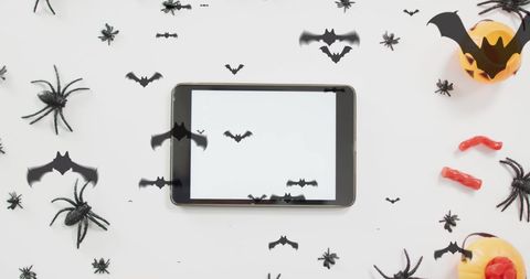Halloween spooky decorations with tablet mockup