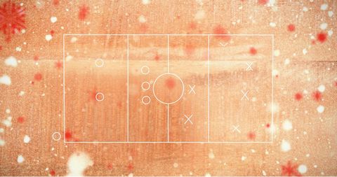 Digital game plan overlay on orange snowy background