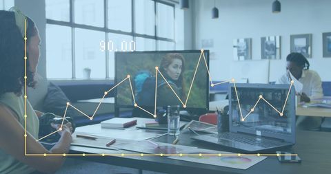 Diverse Team Collaborating in Trendy Modern Office with Digital Interface Overlay