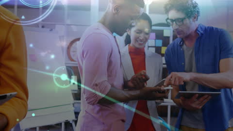 Diverse Business Team Analyzing Digital Networks in Modern Office