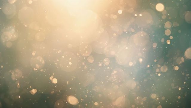 Dreamy ethereal gold teal bokeh lights floating dust particles soft glow texture