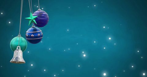 Festive Christmas Baubles with Falling Snow on Teal Background