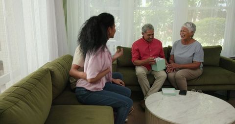 Family sharing laughter and stories at home