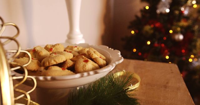Plate of christmas cookies on wooden table during christmas 4k