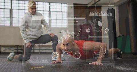 Male athlete performing push-up with trainer coaching and fitness hud performance metrics
