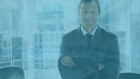 Smiling Businessman in Data Overlay Corporate Environment