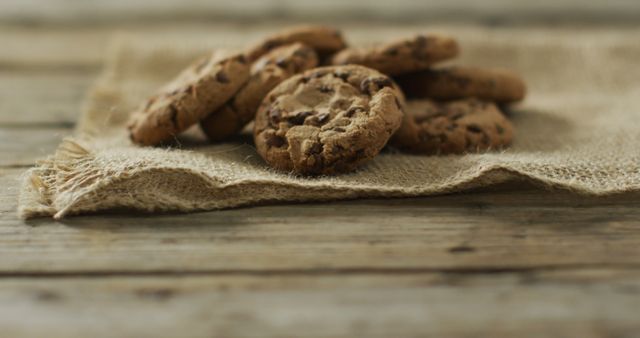 Image of biscuits with chocolate on wooden background - Download Free Stock Photos Pikwizard.com