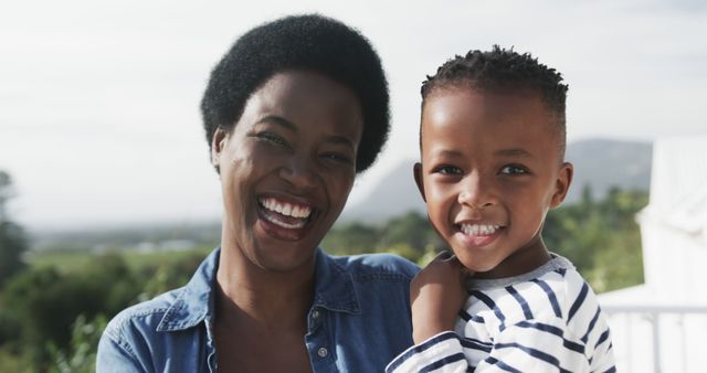 Happy Mother and Child Smiling Outdoors in Sunny Weather - Download Free Stock Images Pikwizard.com