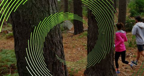 Couple Running in Forest with Dynamic Digital Spiral - Download Free Stock Images Pikwizard.com
