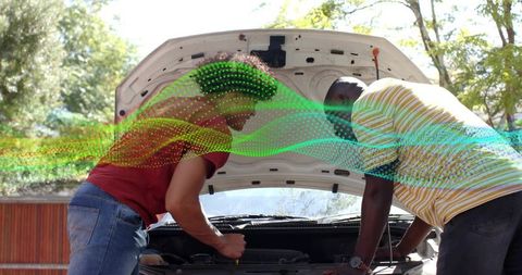 Two Men Inspecting Car Engine with Digital Data Wave Overlay, Outdoor Auto Repair Teamwork