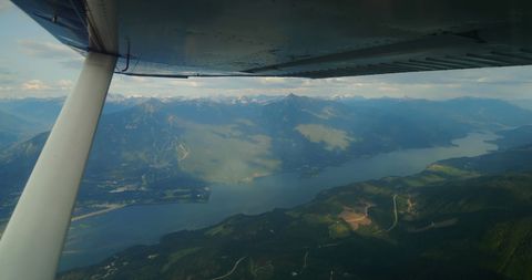Aerial View of Serene Mountain Landscape and Winding Lake - Download Free Stock Images Pikwizard.com