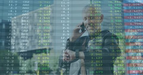 Businessman Interacting with Stock Market Data Overlay