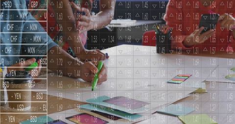 Diverse team meeting with stock market overlay in modern office