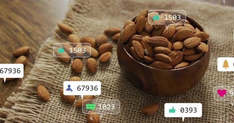 Almonds in wooden bowl with social media engagement