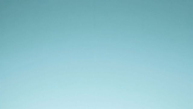 Soothing cyan to light-blue sky gradient creating airy minimalist background for design