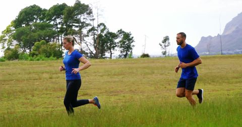 Couple Jogging in Nature Embracing Fitness Lifestyle