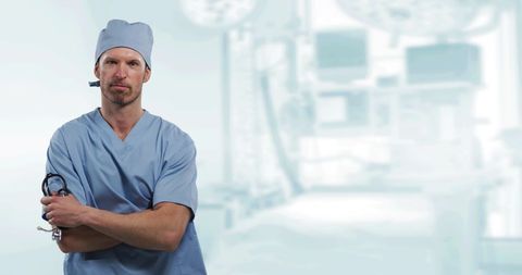 Confident Male Doctor Holding Stethoscope in Hospital