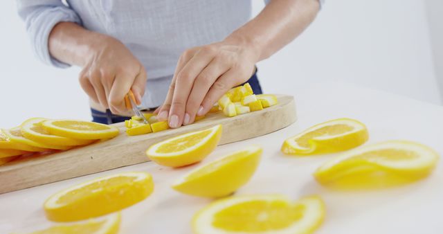Person Slicing Fresh Oranges on Cutting Board - Download Free Stock Images Pikwizard.com