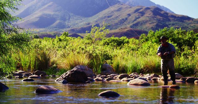 Man Fly Fishing in Tranquil Mountain Stream During Daytime - Download Free Stock Images Pikwizard.com