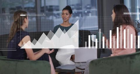 Female leader presenting strategy and infographics during collaborative business meeting
