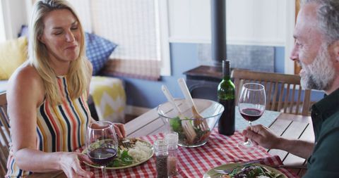 Smiling Couple Enjoying Dinner at Home - Download Free Stock Images Pikwizard.com