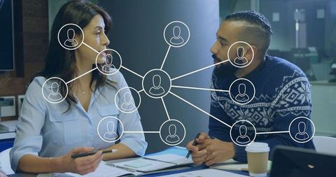 Executives collaborating on networking solutions with innovative overlay