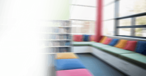 transparent colorful interior with bookcase and vibrant cushions - Download Free Stock Videos Pikwizard.com