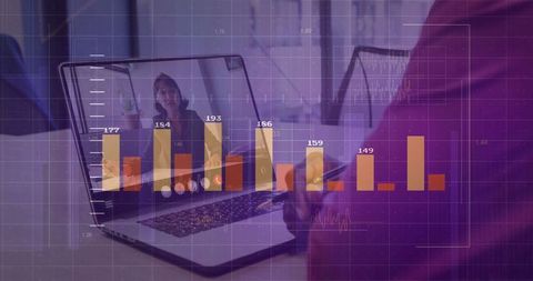 Senior Professional Analyzing Data on Laptop During Virtual Meeting