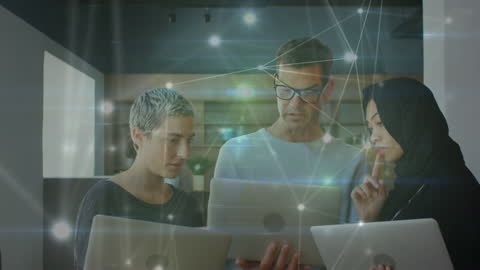 Diverse Team Collaborating with Technology and Connections