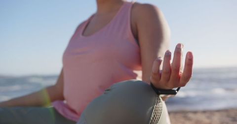 Woman Meditating on Beach Fostering Wellness and Mindfulness Outdoors
