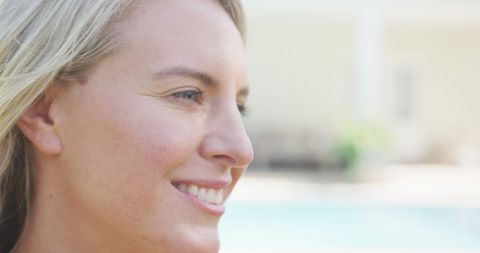 Smiling Woman Reflecting by Poolside in Outdoor Setting - Download Free Stock Images Pikwizard.com