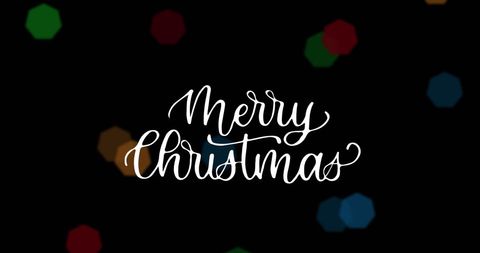 Merry Christmas Text with Colorful Bokeh Lights