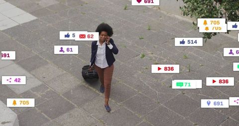 Professional Woman with Suitcase Using Smartphone Outdoors