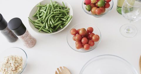Fresh Vegetable Salad Ingredients on Kitchen Table - Download Free Stock Images Pikwizard.com