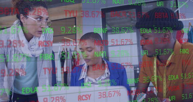 This visually engaging scene captures a diverse team of coworkers focusing on financial data displayed on a laptop, with a digital stock market ticker overlay representing market trends. Use this image to illustrate teamwork in finance, business analytics, financial services, and collaborative corporate environments.