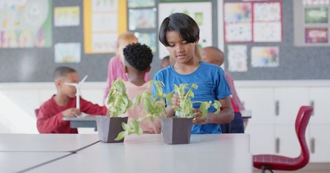 Children learning about plants in science classroom
