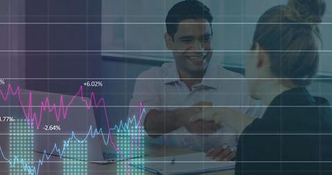 Business Partners Shaking Hands with Financial Data Overlay - Download Free Stock Images Pikwizard.com