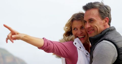 Joyful Middle-aged Couple Enjoying Outdoor Moment - Download Free Stock Images Pikwizard.com