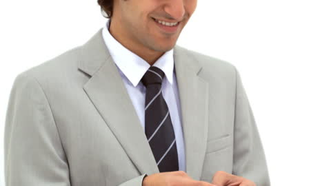 Smiling Businessman Texting on Smartphone