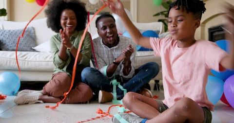Happy Family Celebrating Boy’s Birthday at Home